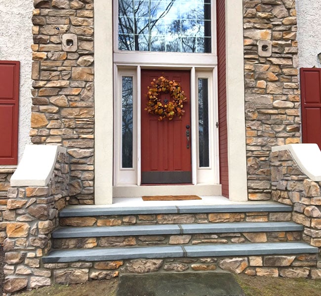 Beautiful home entrance with restored stairs