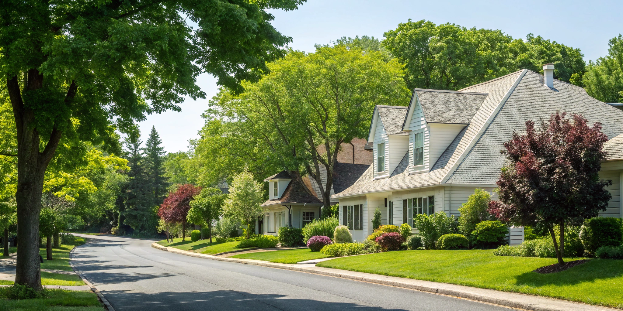 A new roof on a house, a major factor in the total roof replacement cost.