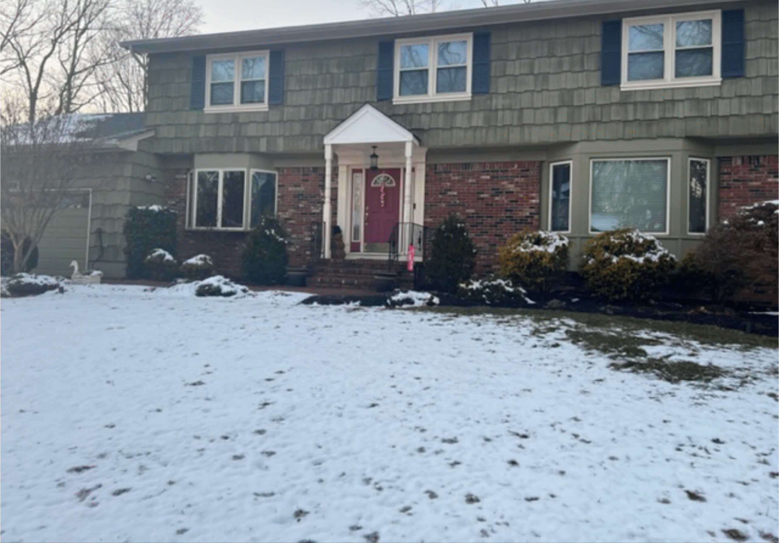 Garden State Brickface and Siding specialist completing high-quality stucco in Rumson, NJ with skilled workmanship and attention to detail. Stucco near me.